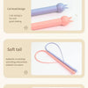 A set of silicone cat toys featuring a head design and soft tail for scratching and biting interactions.