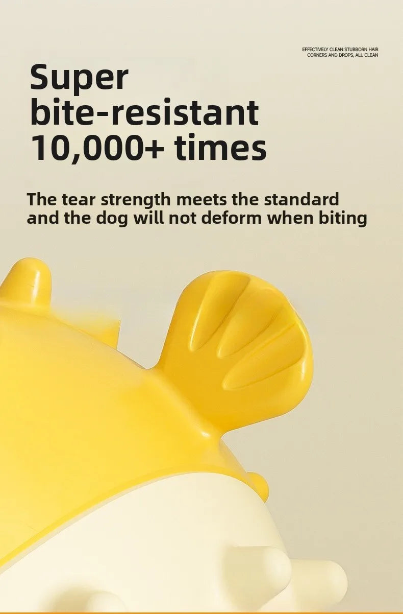A close-up of a yellow and white interactive bouncing fish treat dispenser for pets.