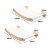 A wooden cat climbing hammock with white fabric and light wood frame shown from above.