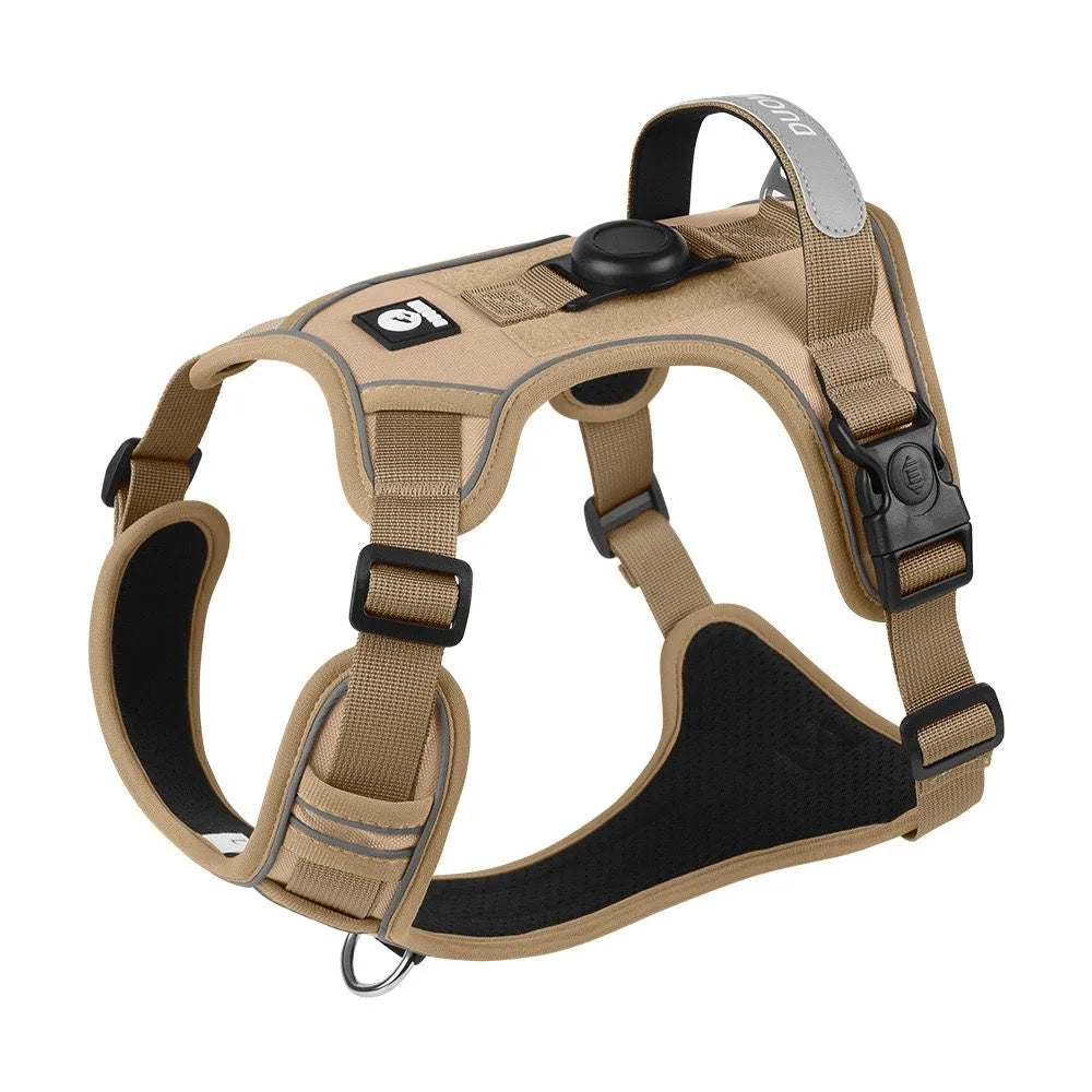 A tan dog harness with a black Airtag holder and leash set is shown against a white background.