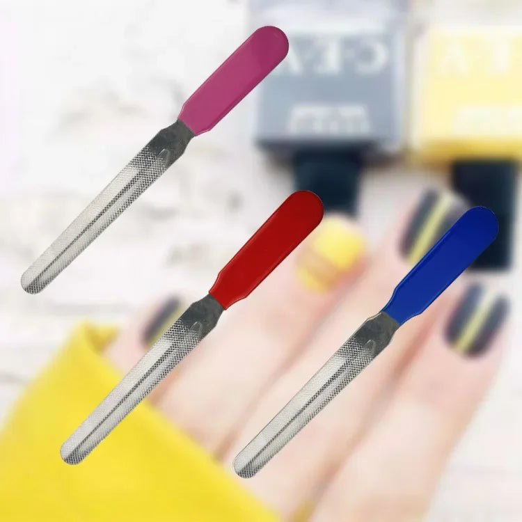 Three stainless steel pet nail clippers in pink, red, and blue are shown on a hand.