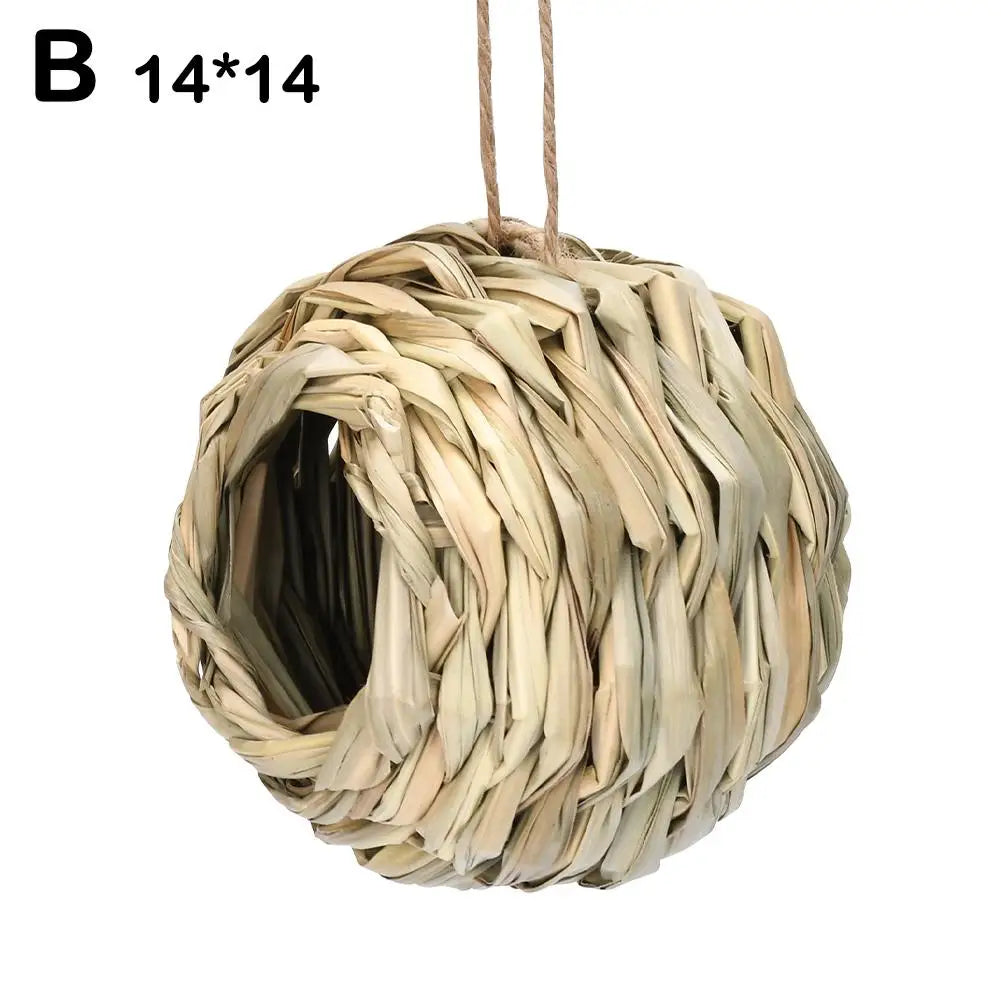Handwoven straw bird nest for parrots with a round, woven structure.