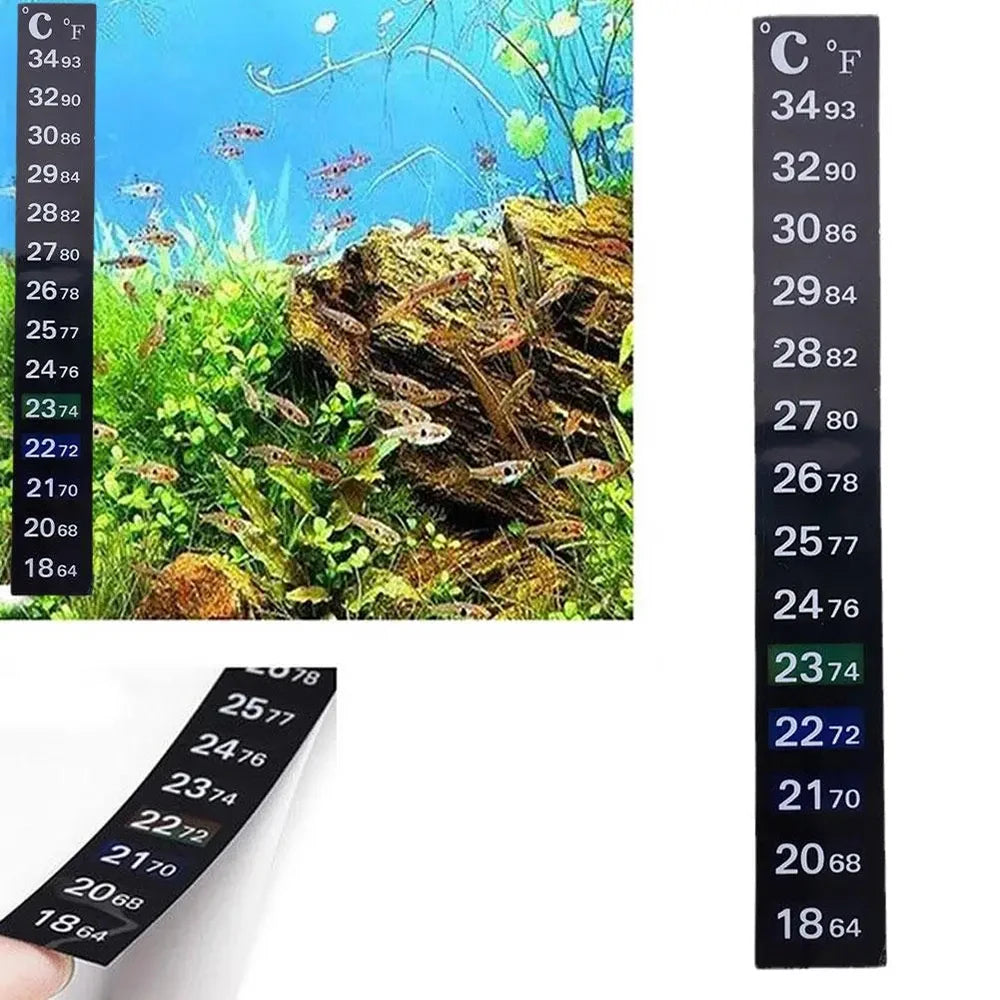 Schwarzer Thermometerstreifen mit Temperaturangaben in Celsius und Fahrenheit neben einem Aquariumblick.