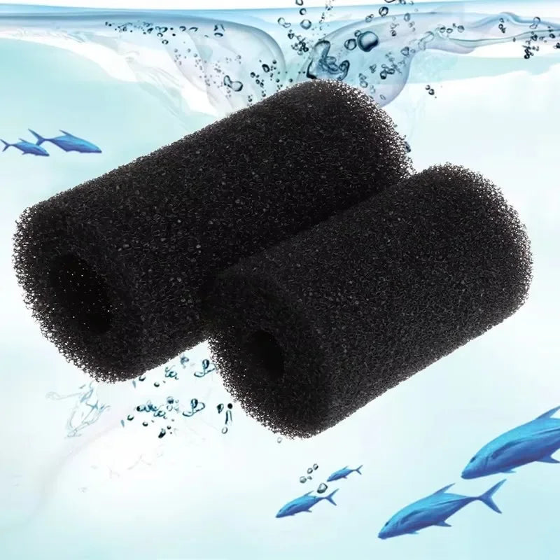 A black sponge pre-filter is shown underwater with small fish swimming around it.