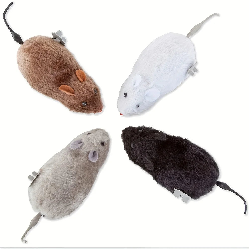 Three plush mouse toys in brown, white, and black colors shown from above.