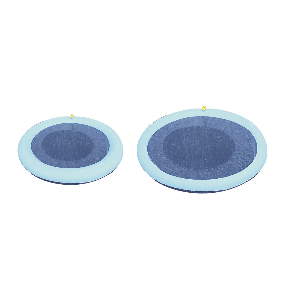 A pair of blue and light blue anti-slip sprinkler mats for a dog splash pad.