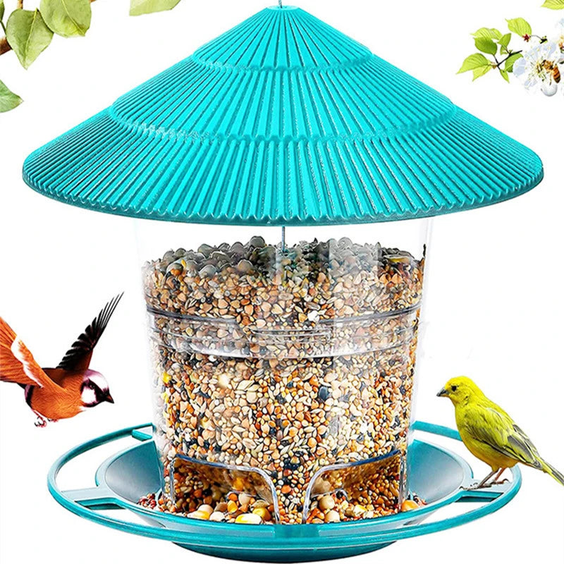Nourrice à oiseaux waterproof turquoise suspendue, remplie de graines mélangées, pour décoration de jardin.