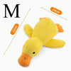 A yellow plush duck dog chew toy with orange accents, shown against a white background.