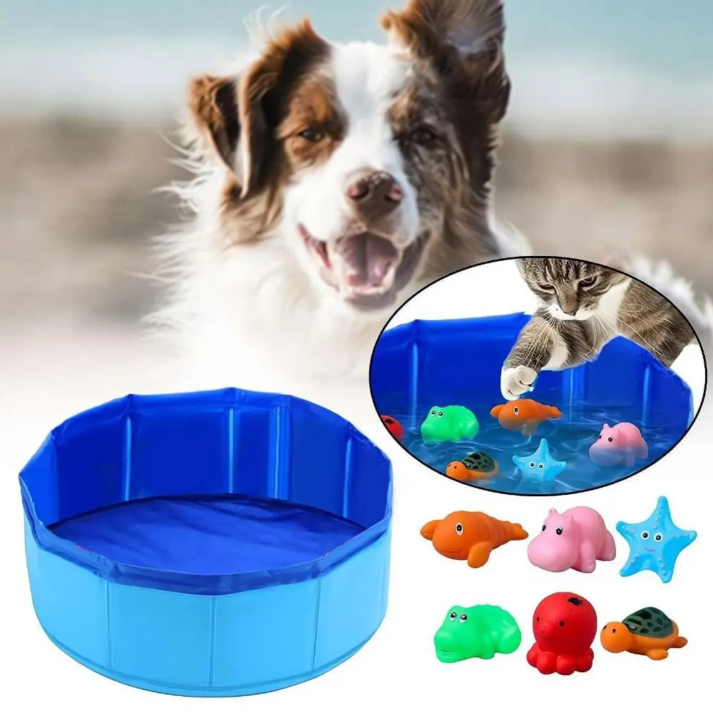 Blue foldable pet bathing pool with sea life design featuring various colored plastic toys.