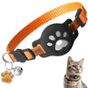 An orange adjustable cat collar with a paw print design and an attached silver bell, shown next to a cat.