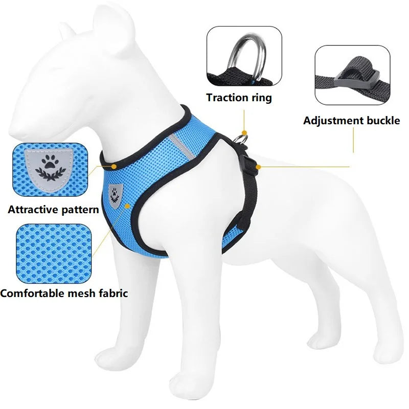 A blue and black mesh harness for dogs, featuring a traction ring and adjustment buckle.