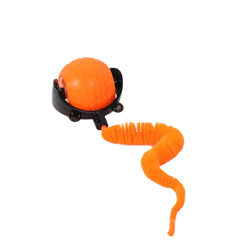 An orange, spherical pet ball toy for cats with a flexible, orange, coiled tail.