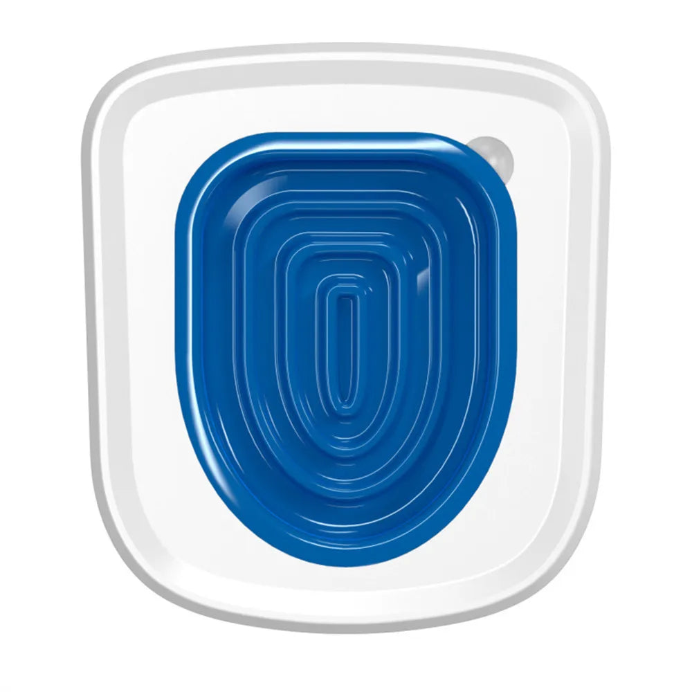 Producto de silicona ovalado blanco con inserto texturizado azul para entrenamiento de inodoro felino.