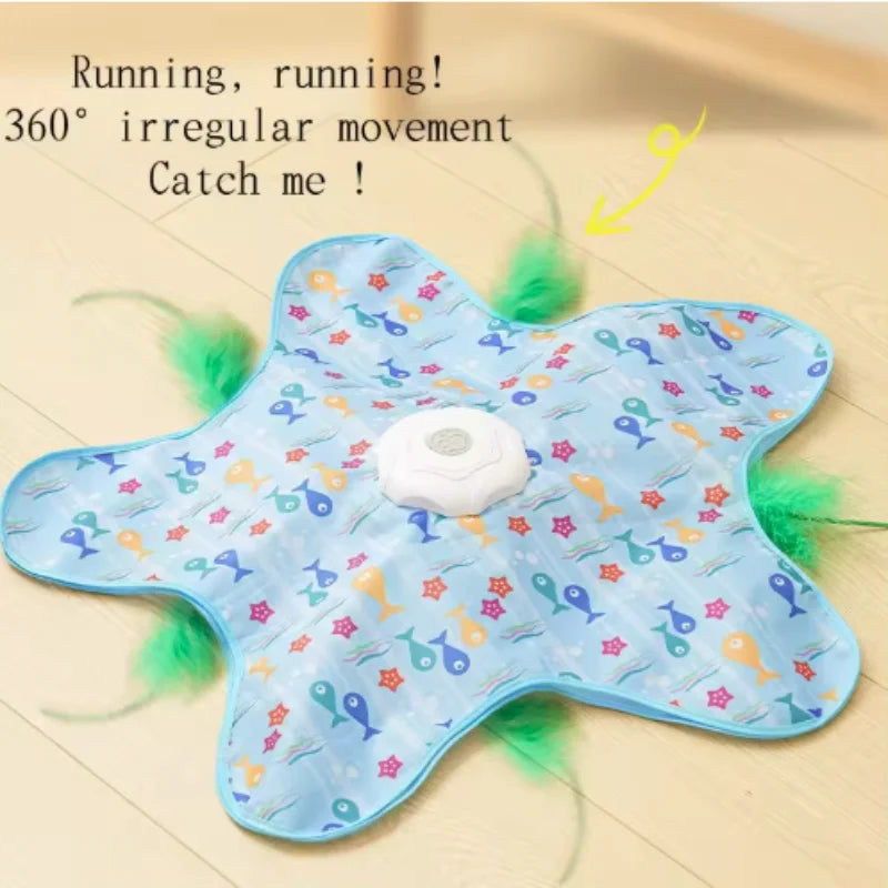 Light blue, star-shaped interactive cat toy with green fuzzy accents designed for irregular movement play.