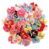 A colorful bouquet of elegant lace dog hairbows in shades of pink, purple, red, and yellow.