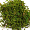 A pile of bright green artificial moss used for crafts, models, and home decor.