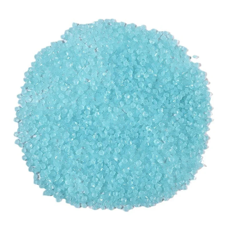 A pile of light blue glow-in-the-dark decorative pebbles.