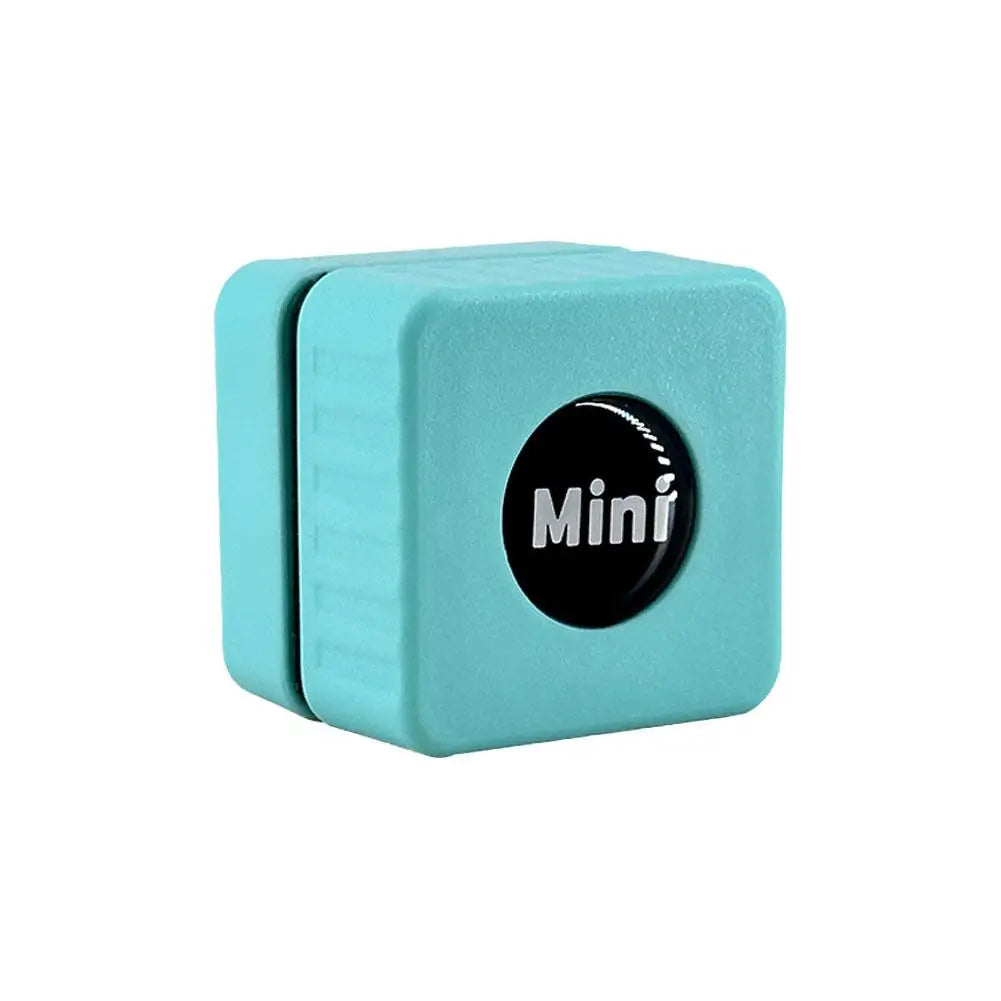 A teal magnetic aquarium glass cleaner with a black circular attachment.