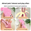 Pink plush octopus dog toy with a cotton rope tail for pet play and teething
