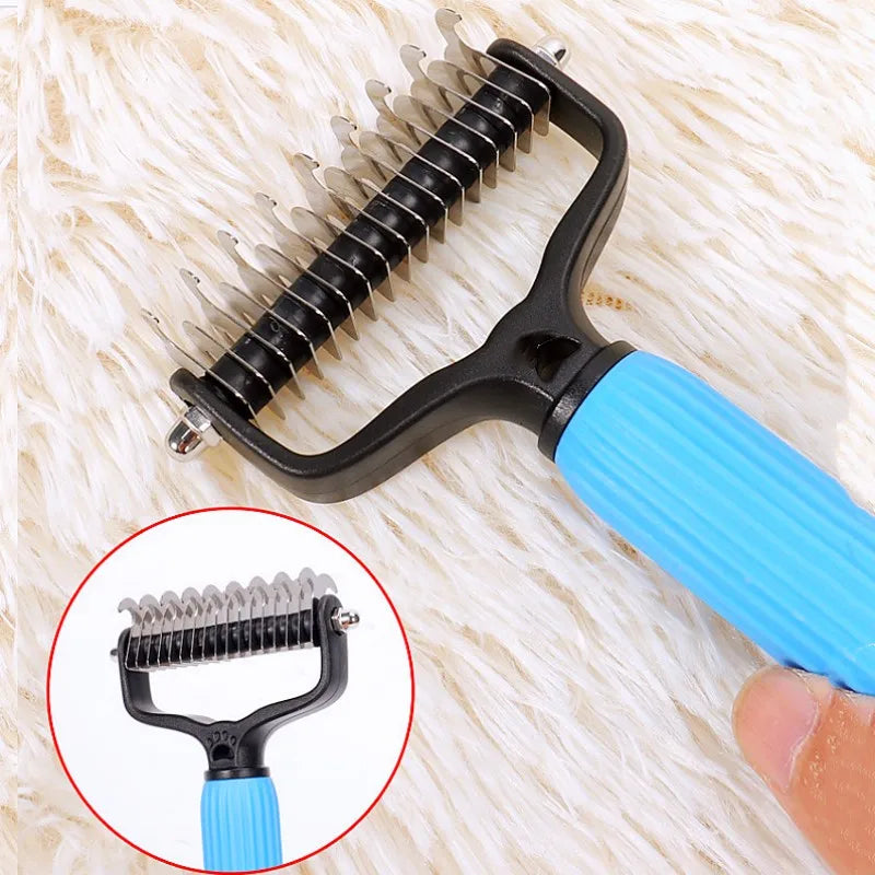 A black and blue double-sided stainless steel dematting comb for dogs shown on a white fluffy surface.