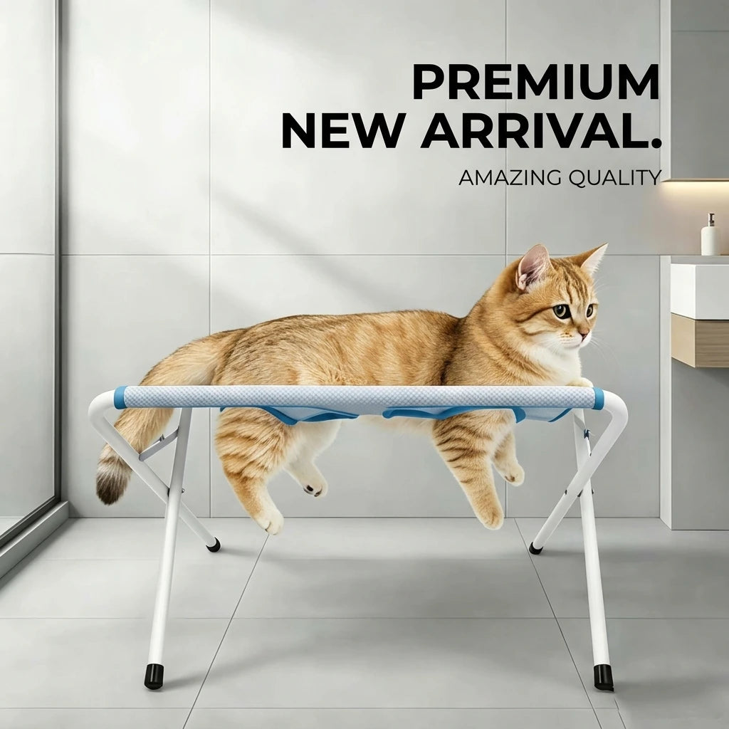 A fluffy orange tabby cat is relaxing on a white foldable pet grooming hammock station.