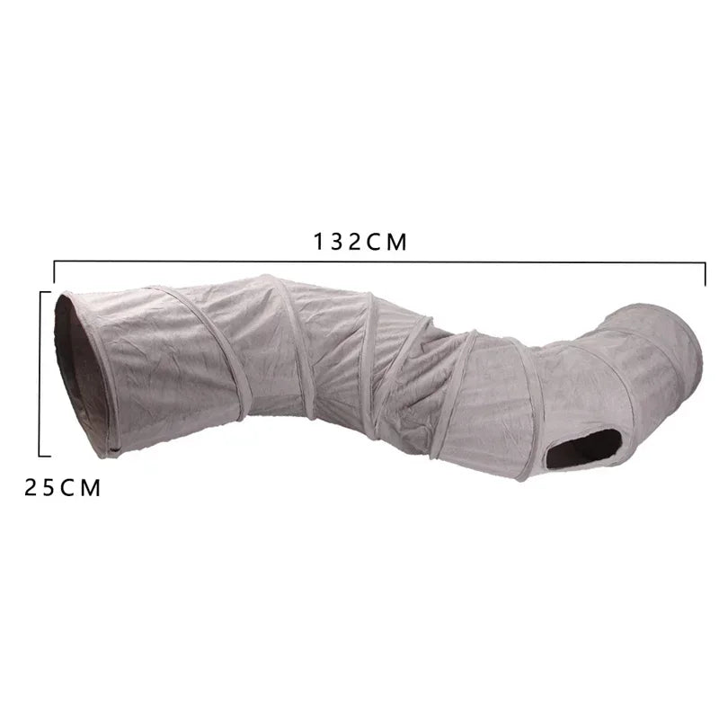 A light gray foldable S-shape cat tunnel with a suede finish, shown in profile.