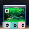 A magnetic aquarium glass cleaner featuring four small, square cleaning blocks in white, teal, and pink colors.