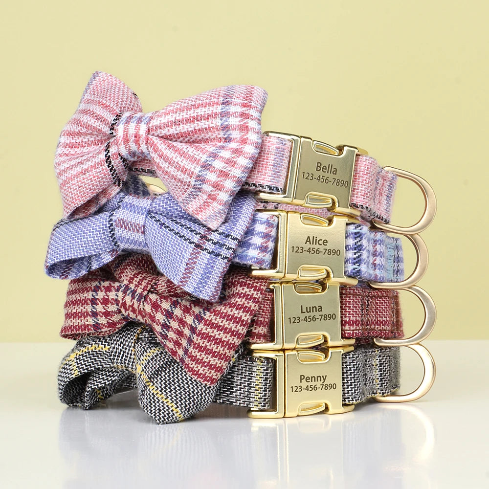 A stack of personalized bowtie dog collars featuring plaid fabric and gold nameplates for Bella, Alice, and Luna.