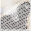 Close-up view of a beige mesh nylon dog harness and leash set for small pets