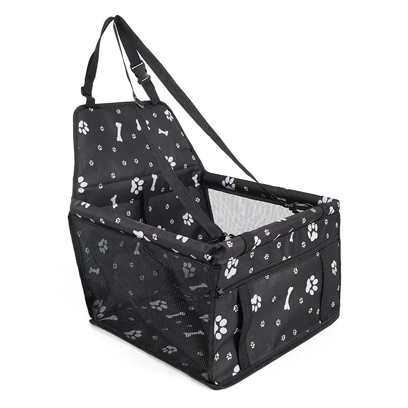 Black pet travel booster seat with a safety belt for dogs and cats