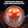 A clear spherical device with an internal light glows, suggesting a motor allows play without disconnection.