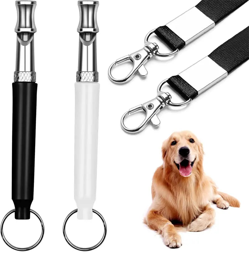 A set of adjustable ultrasonic dog whistles and a golden retriever.