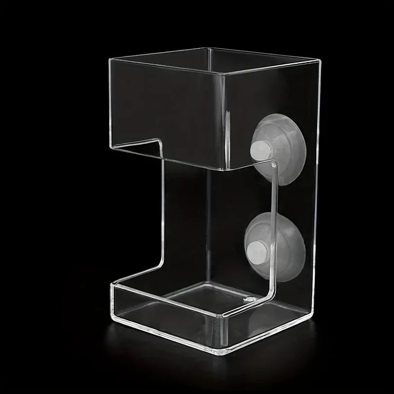 Clear acrylic aquarium fish feeder ring with a tray and a circular feeding disc.
