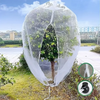Extra-thick garden netting with a zipper and drawstring protecting a tree from birds and insects.