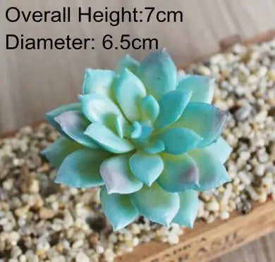 A light blue artificial succulent plant with thick leaves is displayed on a wooden surface.