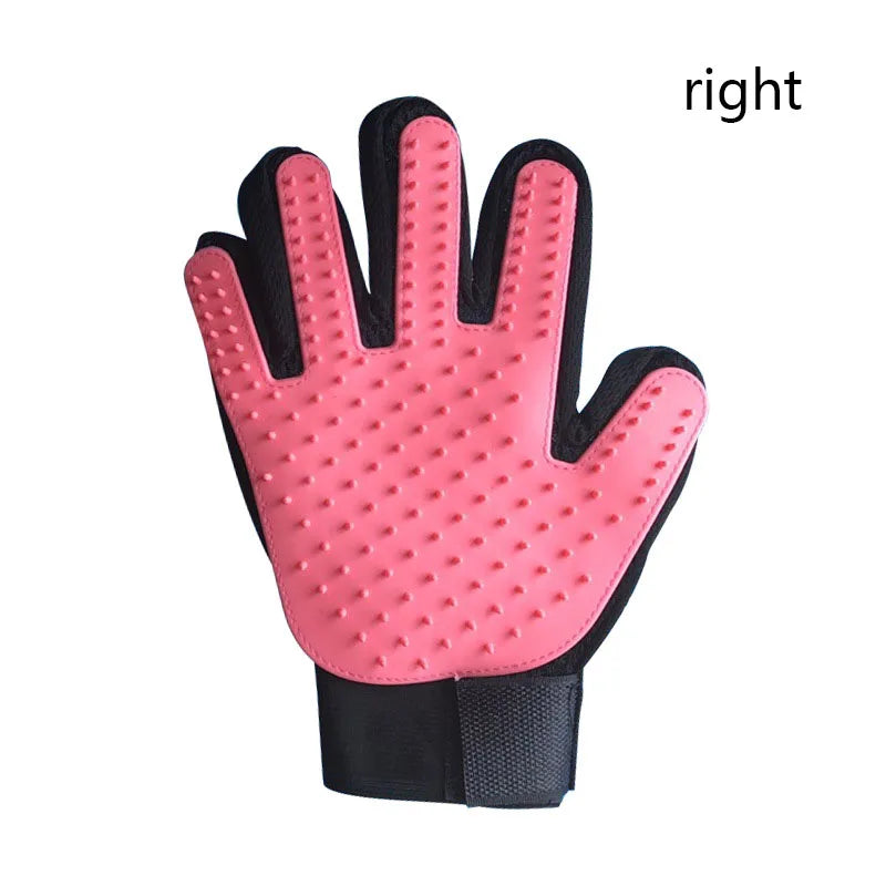 A pink silicone pet grooming glove with a black cuff and textured palm for gentle de-shedding.