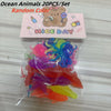 A clear plastic bag contains ten colorful soft rubber goldfish bath toys for kids.