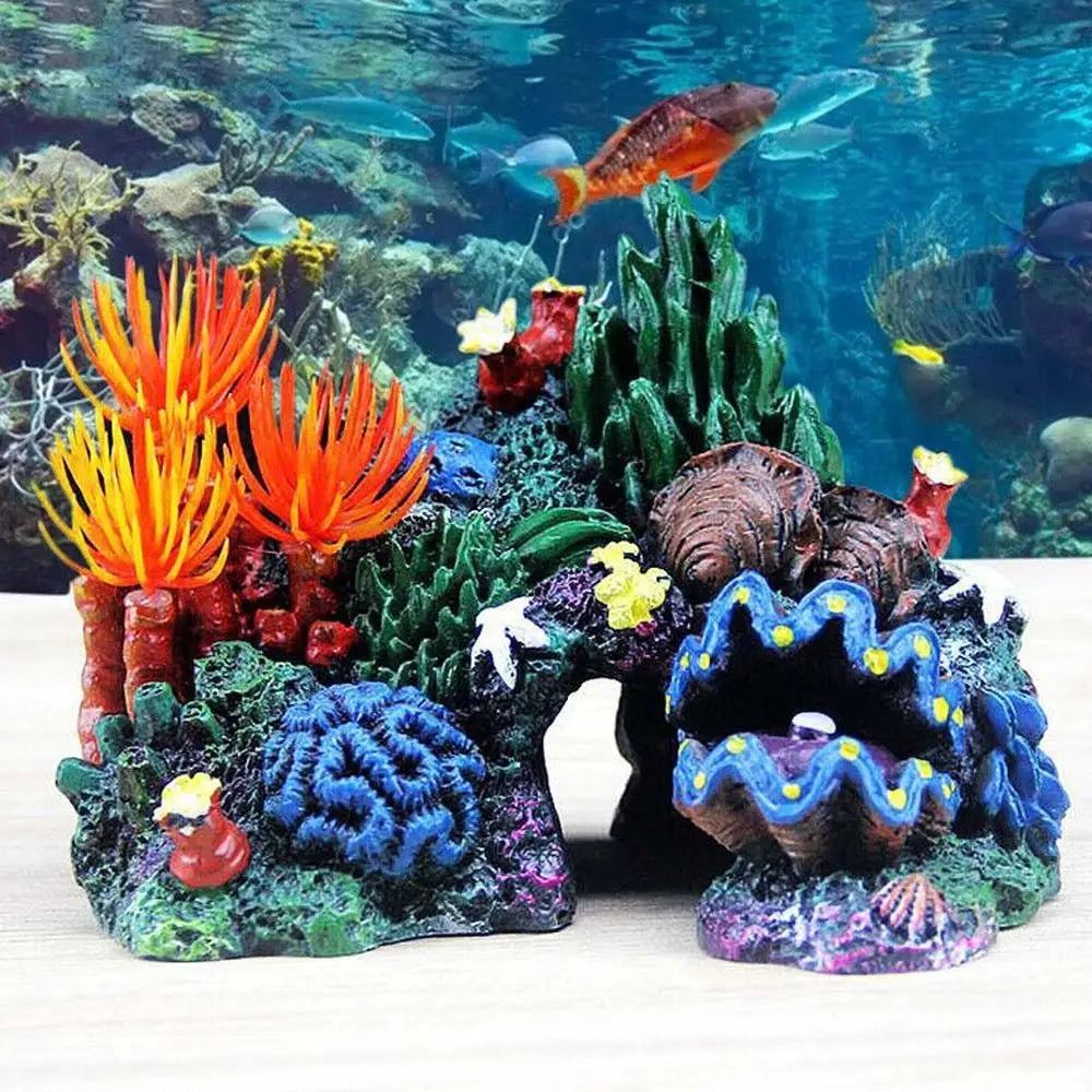 A detailed simulated coral reef island aquarium ornament featuring vibrant orange and yellow sea fans and various colorful ma