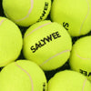 A close-up view of three bright yellow tennis balls with pink stitching.