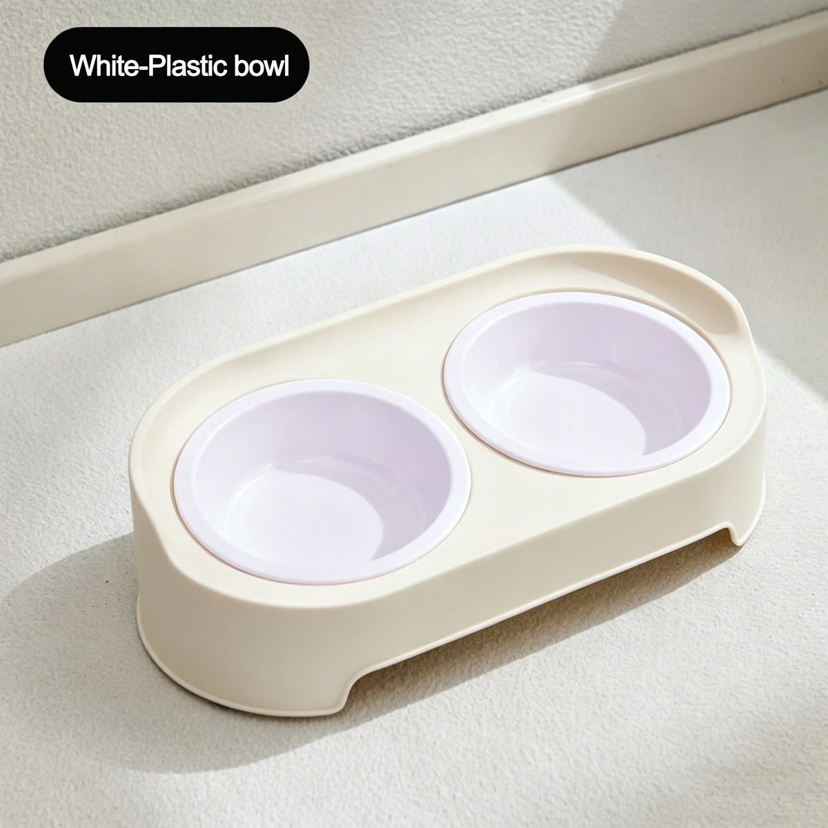 A white plastic bowl feeder stand with two nested bowls for pets.