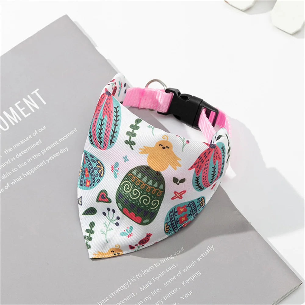 A printed pet collar with a matching bandana featuring colorful patterns for small dogs and cats.