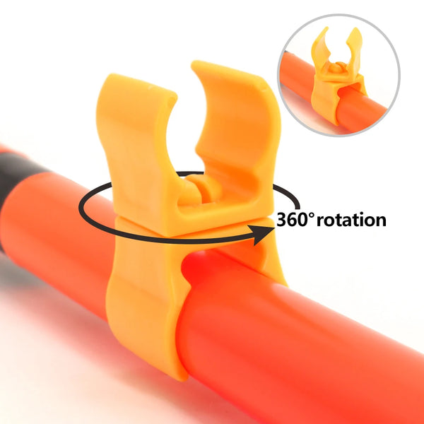 Orange portable dog agility training jump set attached to a red pipe, showing 360 degree rotation capability.