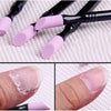 A set of pink nail files, cuticle pushers, and buffer tools are shown next to a hand applying the product.