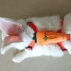 A white cartoon rabbit harness and leash set with orange accents and a green leaf detail.