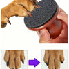 A paw is being filed using a wooden-handle dog nail file with reusable sandpaper pads, showing before and after results.