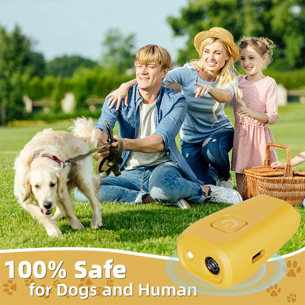 A yellow ultrasonic dog bark stopper device is shown outdoors with a man, a woman, and a dog in a grassy field.