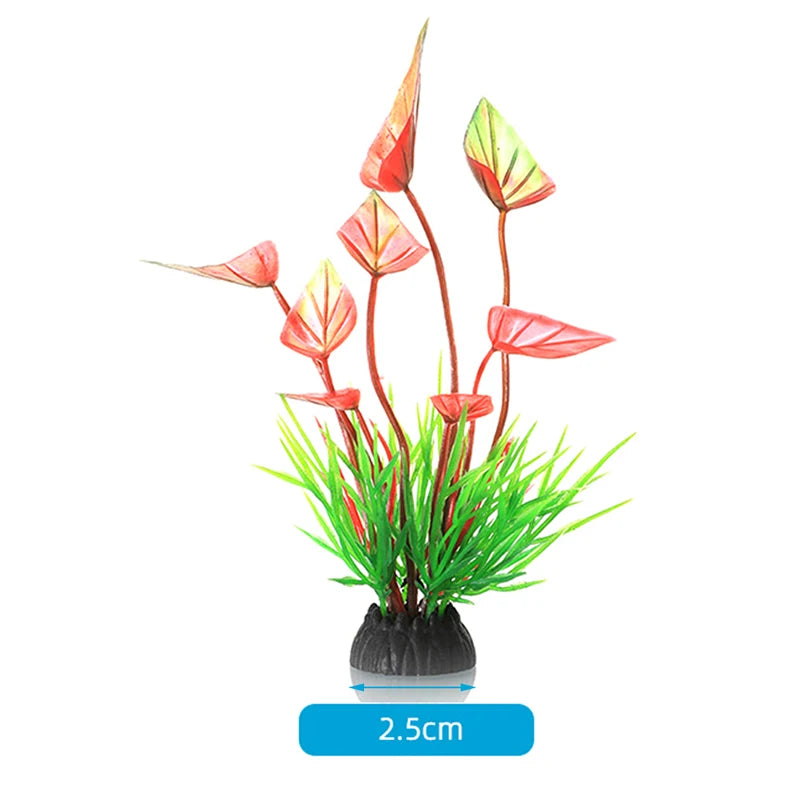 A plant arrangement featuring red and green leaves and bright green grass for aquarium decor.
