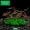 Gros plan de plantes aquatiques artificielles rouges dans un petit paysage.
