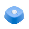 A bright blue spill-resistant lick bowl with a white rolling ball for liquid treats.