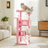 A multi-level pink cat tree with scratching posts and condos, featuring a fluffy cat perched on the top level.
